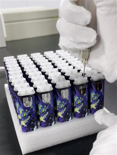 Przenośne ręczne półautomatyczne ogrzewanie 51 0 płynne maszyna do napełniania wózka Vape Wózki wypełniające olej THC Urządzenie .5ml 0. 8 ml 2.0ml